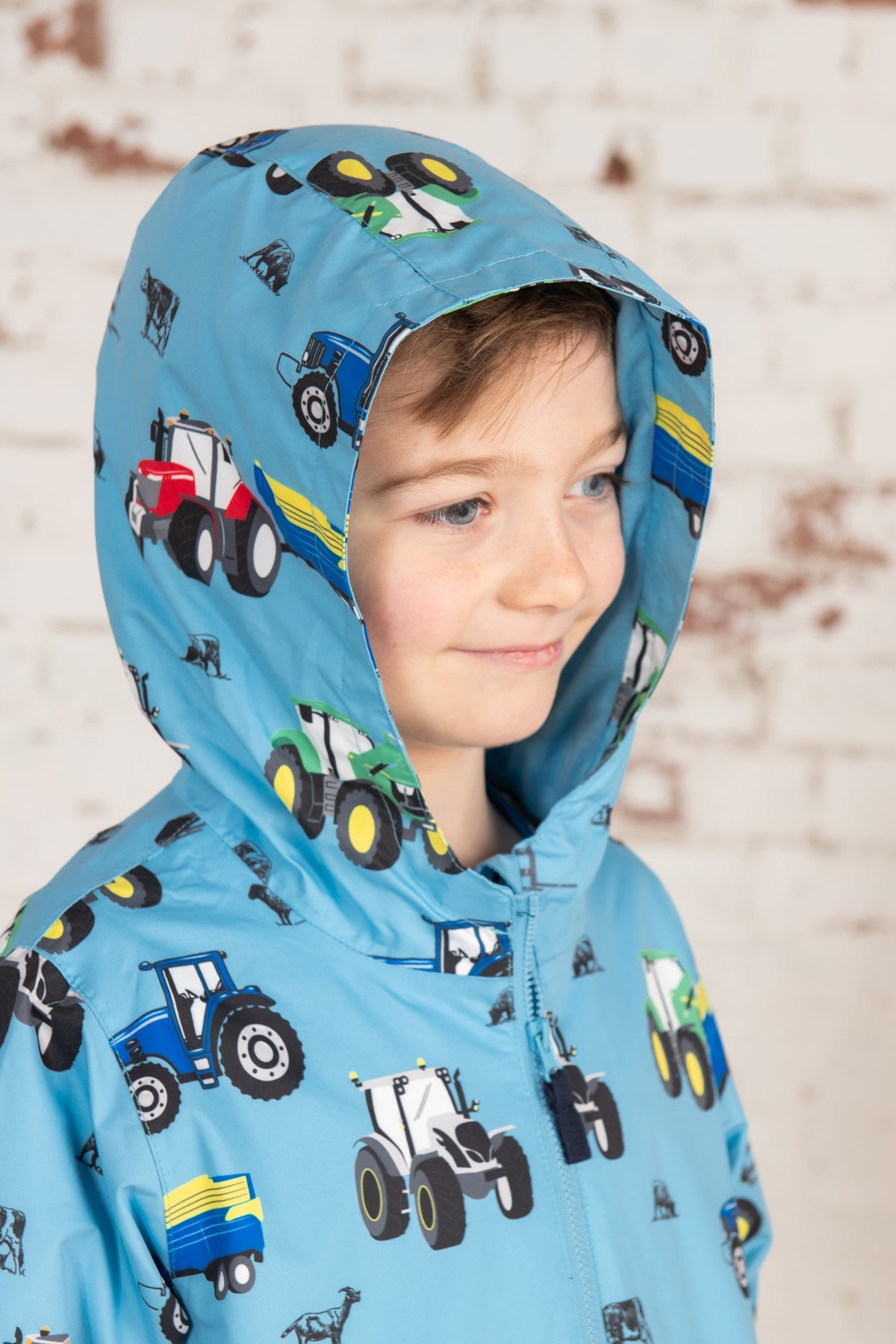 Ethan. Boys Waterproof Jacket Blue Tractor Print Lighthouse